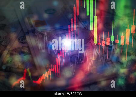 Close up of abstract business chart bars and arrows on dark background with binary code. Stock Photo
