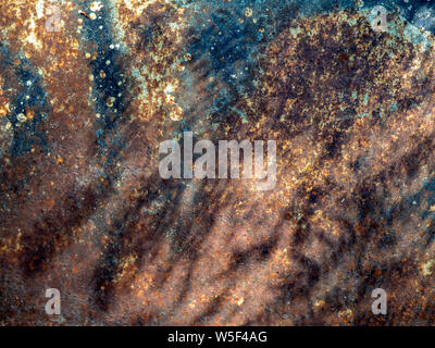 Cracked colorful paint and rust of metal on the car body, iron rusty artistic wall car peeling paint Stock Photo