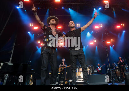 Bros perform live on stage at the Botanic Gardens in Belfast, Northern Ireland. Featuring: Matt Goss, Luke Goss, Bros Where: Belfast, County Down, United Kingdom When: 27 Jun 2019 Credit: WENN.com Stock Photo