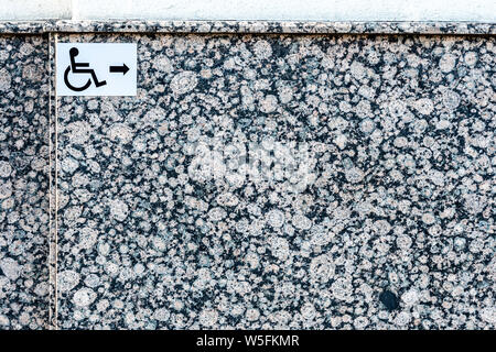 Close up of a gray granite wal tevture - image Stock Photo