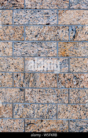 Close up of a granite brick-wall - Image Stock Photo