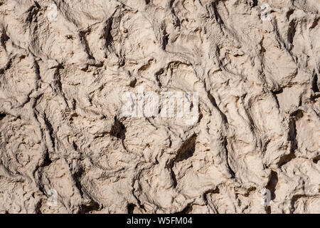 Decorative exterior wall plaster with embossed surface - image Stock Photo