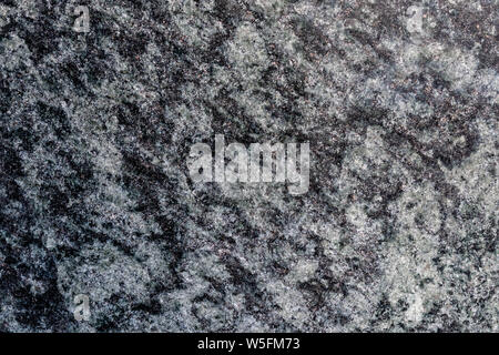 Close up of a gray granite wal tevture - image Stock Photo