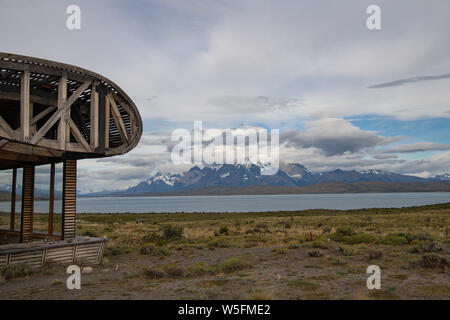 building looking out over beautiful scene of lakes and mountains in Torres Del Paine Patagonia, Chile Stock Photo