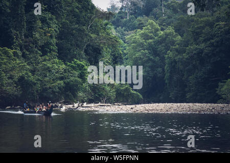 Boat is a main transportation in tropical rain forest landscape at Taman Negara, Pahang, Malaysia. Stock Photo