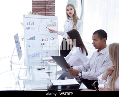 business woman making presentation to business partners Stock Photo