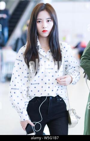 Chinese actress and singer Ju Jingyi arrives at an airport in Shanghai, China, 18 March 2019. Stock Photo