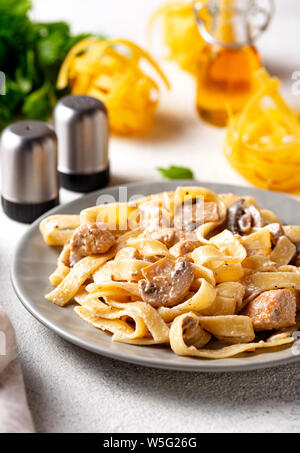 Pasta with chicken and mushroom Stock Photo