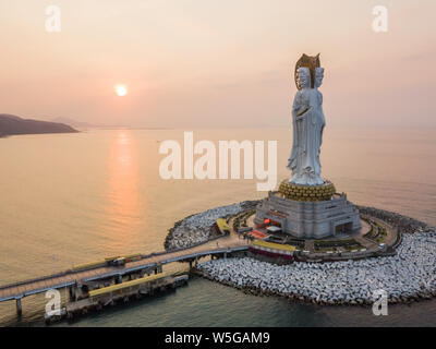 View of the Guanyin of Nanshan statue near the Nanshan Temple of Sanya in Sanya city, south China's Hainan province, 25 March 2019.    The Guanyin of Stock Photo