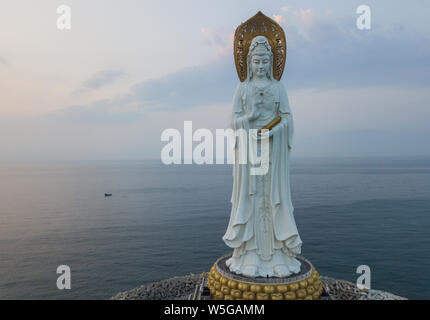 View of the Guanyin of Nanshan statue near the Nanshan Temple of Sanya in Sanya city, south China's Hainan province, 25 March 2019.    The Guanyin of Stock Photo