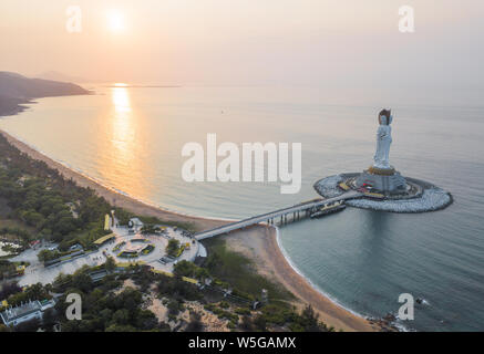 View of the Guanyin of Nanshan statue near the Nanshan Temple of Sanya in Sanya city, south China's Hainan province, 25 March 2019.    The Guanyin of Stock Photo