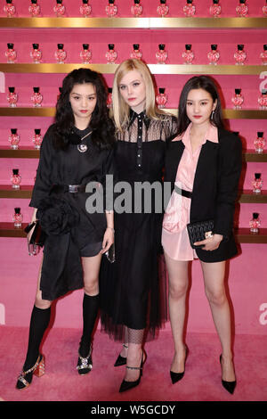 From left) Chinese actress Chun Xia, American actress and fashion model Elle  Fanning, and Chinese actress Song Zuer attend a promotional event for Mi  Stock Photo - Alamy