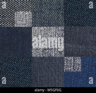 Photo with denim texture fabric. Background with the composition of different types of denim fabric in different colors