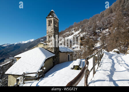 Italy, Lombardy, Retiche Alps, Camonica Valley, the trail to the ancient alpine church of San Clemente Stock Photo