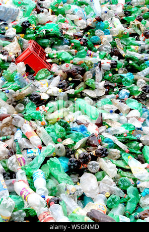 SKOPJE, MACEDONIA-DEC 12, 2008: Close-up view plastic bottles of various drinks in the yard of a company specializing in ecological treatments. Large Stock Photo
