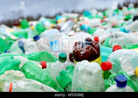 SKOPJE, MACEDONIA-DEC 12, 2008: Close-up view plastic bottles of various drinks in the yard of a company specializing in ecological treatments. Large Stock Photo