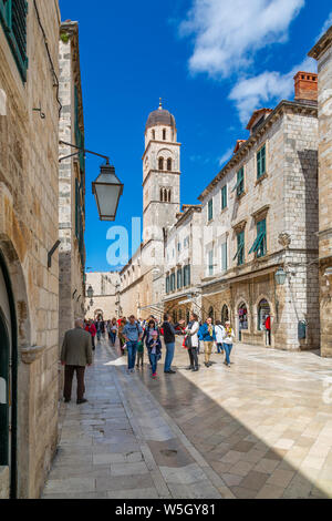 Visitors on Stradun and Franciscan Church and Monastery, Dubrovnik Old Town, UNESCO World Heritage Site, Dubrovnik, Dalmatia, Croatia, Europe Stock Photo