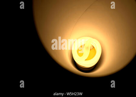 Warm light energy saving CFL, close up Stock Photo