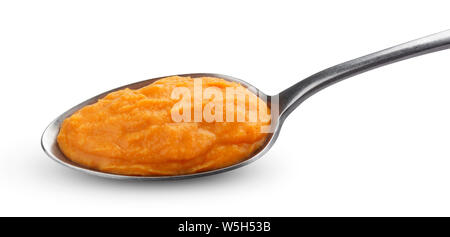 Pumpkin and carrot baby puree in spoon isolated on white background Stock Photo