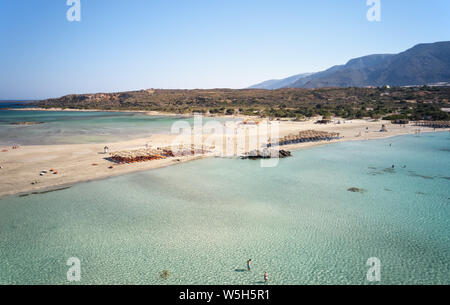 Aerial bird's-eye view from drone on Elafonisi sandy beach on Crete. Elafonissi is one of the most known world beaches and is famous for pink sand. Ki Stock Photo