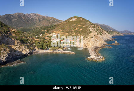 Aerial view from drone on cretan village Almirida and Mediterannean sea. Crete, Greece, Rethymno prefecture. Stock Photo