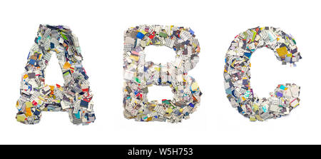 ABC letters made up of color newspaper isolated on white Stock Photo
