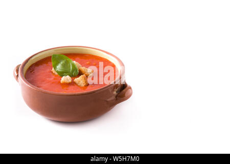 Tomato soup in brown bowl isolated on white background. Copyspace Stock Photo