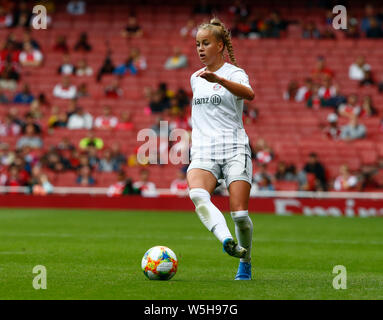 Bayern's Giulia Gwinn heads the ball during the women's quarterfinal Champions  League first leg soccer match between Bayern Munich and Paris Saint-Germain  in Munich, Germany, Tuesday, March 22, 2022. (AP Photo/Matthias Schrader