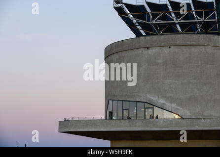 GERMANY Hamburg, IBA international architecture exhibition, an old anti-aircraft war bunker is changed into an 25.000 MW renewable energy project, with biogas, biomass and solar, roof with solar thermal vacuum pipes, public viewing platform and Coffee shop Stock Photo
