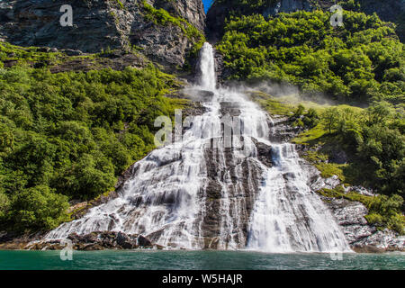 Geiranger fjord, Norway: landscape with mountains and waterfalls at summertime. Norway nature and travel background. Stock Photo