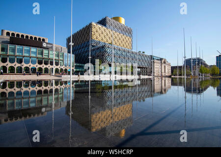 Reflections in the water feature at Centenary Square in Birmingham, West Midlands UK Stock Photo