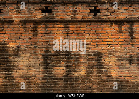 Beautiful brick walls that are not plastered background and texture. Stock Photo