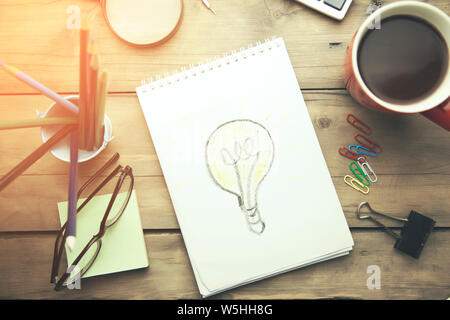 working wooden table on different office accessories Stock Photo