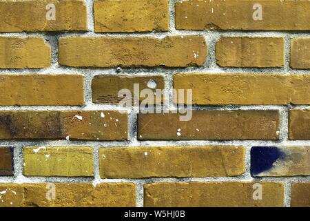 Detailed close up view on yellow colored old and weathered vintage brick walls in high resolution Stock Photo