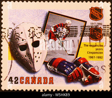 Hockey stuff on canadian postage stamp Stock Photo