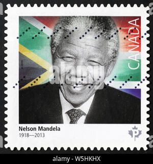 Portrait of Nelson Mandela smiling on canadian stamp Stock Photo