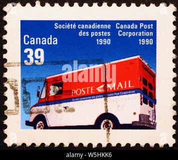 Postal truck on canadian postage stamp