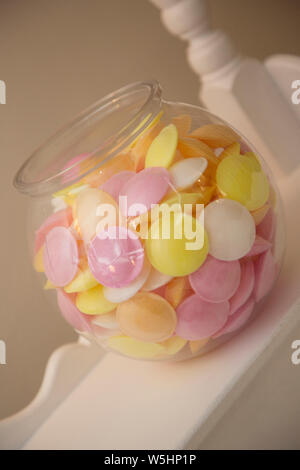 Bowls of sweets on a sweet cart at a wedding reception, waiting for the guests to come along and tuck in, no people, sweeties in jars Stock Photo
