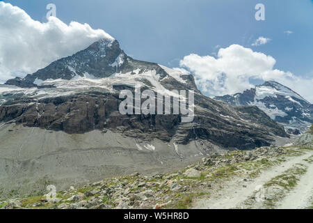 Mountain landscape in the swiss Alps above Zermatt, with Matterhorn summit in background Stock Photo