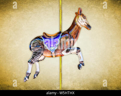 Carnival carousel okapi isolated on blue or gold background Stock Photo