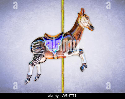 Carnival carousel okapi isolated on blue or gold background Stock Photo