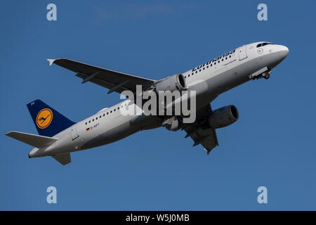 A Lufthansa Airbus A320-200 takes off from Manchester International Airport (Editorial use only) Stock Photo