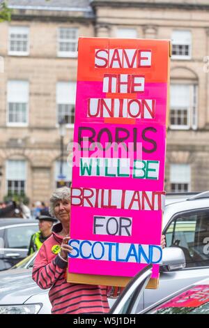 Edinburgh, UK. 29th July, 2019. Prime Minister and Conservative Leader, Boris Johnson visits Bute House to meet First Minister of Scotland, Nicola Sturgeon. Earlier in the day, Johnson announced £300m of funding for projects to boost the economy in Scotland, Wales and Northern Ireland. Pictured: Pro-Union supporters before Boris Johnson arrives Credit: Rich Dyson/Alamy Live News Stock Photo