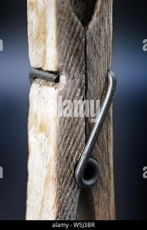 Wooden weathered peg clothespin, isolated on a white background Stock Photo