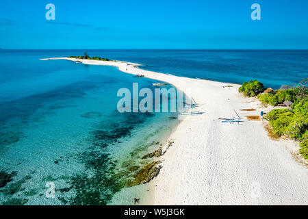 Truly amazing tropical island in the middle of the ocean. Aerial view of an island with white sand beaches and beautiful lagoons Stock Photo