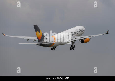 A Thomas Cook Airlines Airbus A330-200 takes off from Manchester International Airport (Editorial use only) Stock Photo