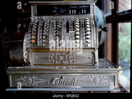 Old fashioned cash machine in a flea market in Bangkok in Thailand in Southeast Asia Far East. Retro Stock Photo