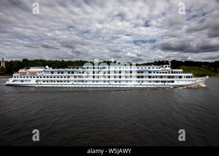 The passenger river boat 'Igor Stravinsky' goes along the Volga river near the Tutaev ancient Russian town, Yaroslavl Oblastl, Russia Stock Photo