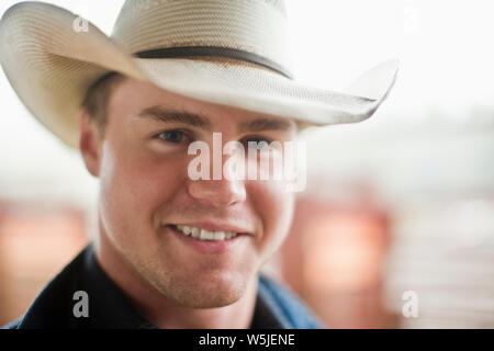 Portrait of young adult cowboy. Stock Photo