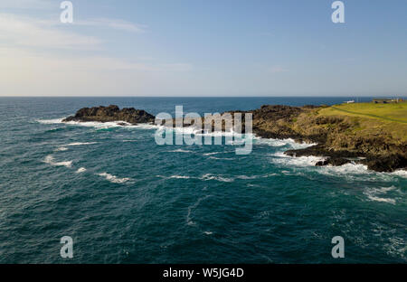 A view from Kiama Blow Hole Point on the south coast of New South Wales, Australia. In aboriginal the word Kiama means ‘where the ocean makes noise’. Stock Photo